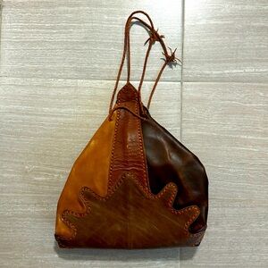 Handmade leather bag 16 inches long 14 1/2 inches wide